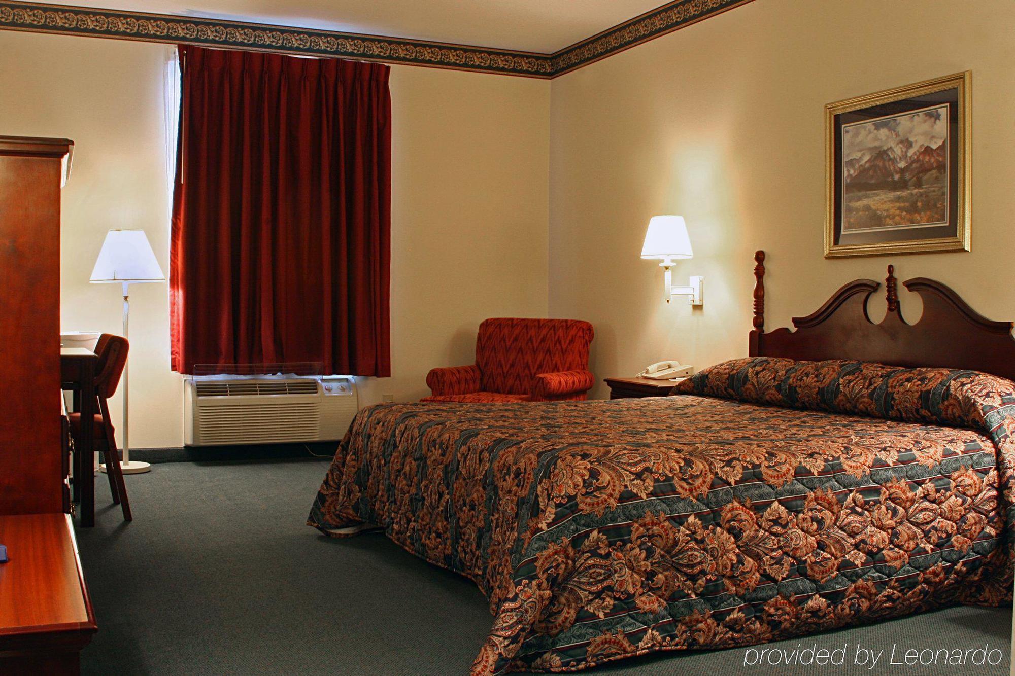 Collins Inn & Suites الغرفة الصورة